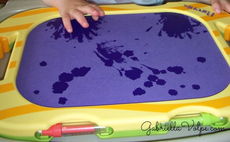 water fabric painting - drawing with the disabled child