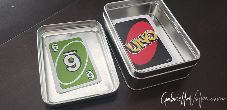 This tin and lid keep the cards contained and more easily stackable 