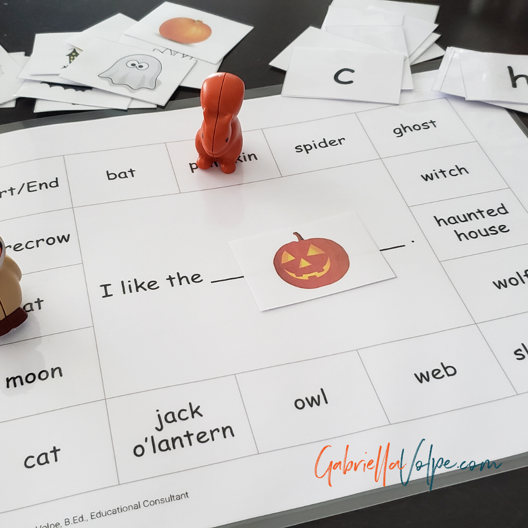 Photo of Halloween word board game with predictable chart option