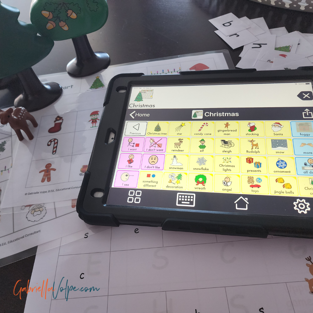 Photo of Christmas Board games in play with AAC device
