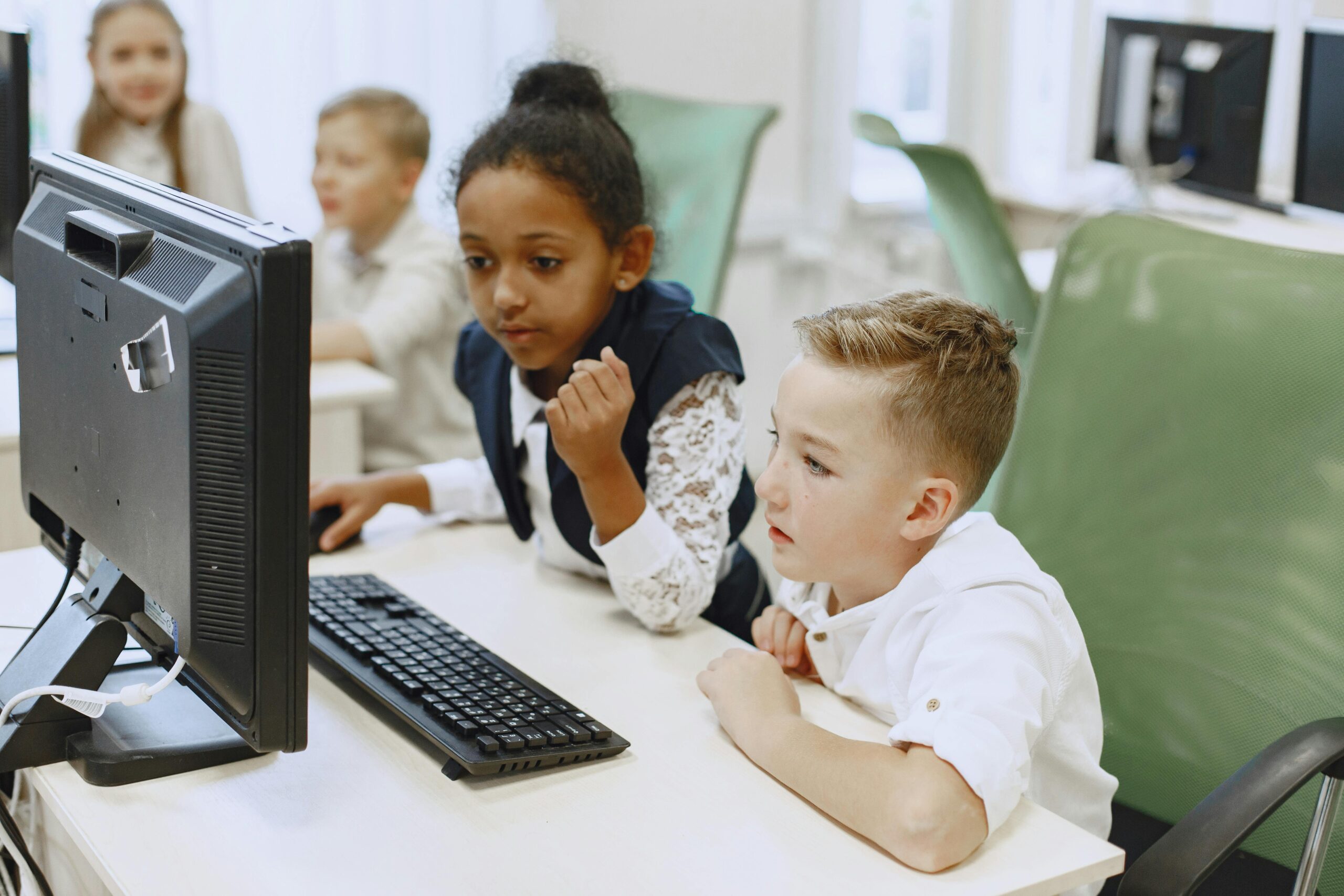 Students learning at a PC