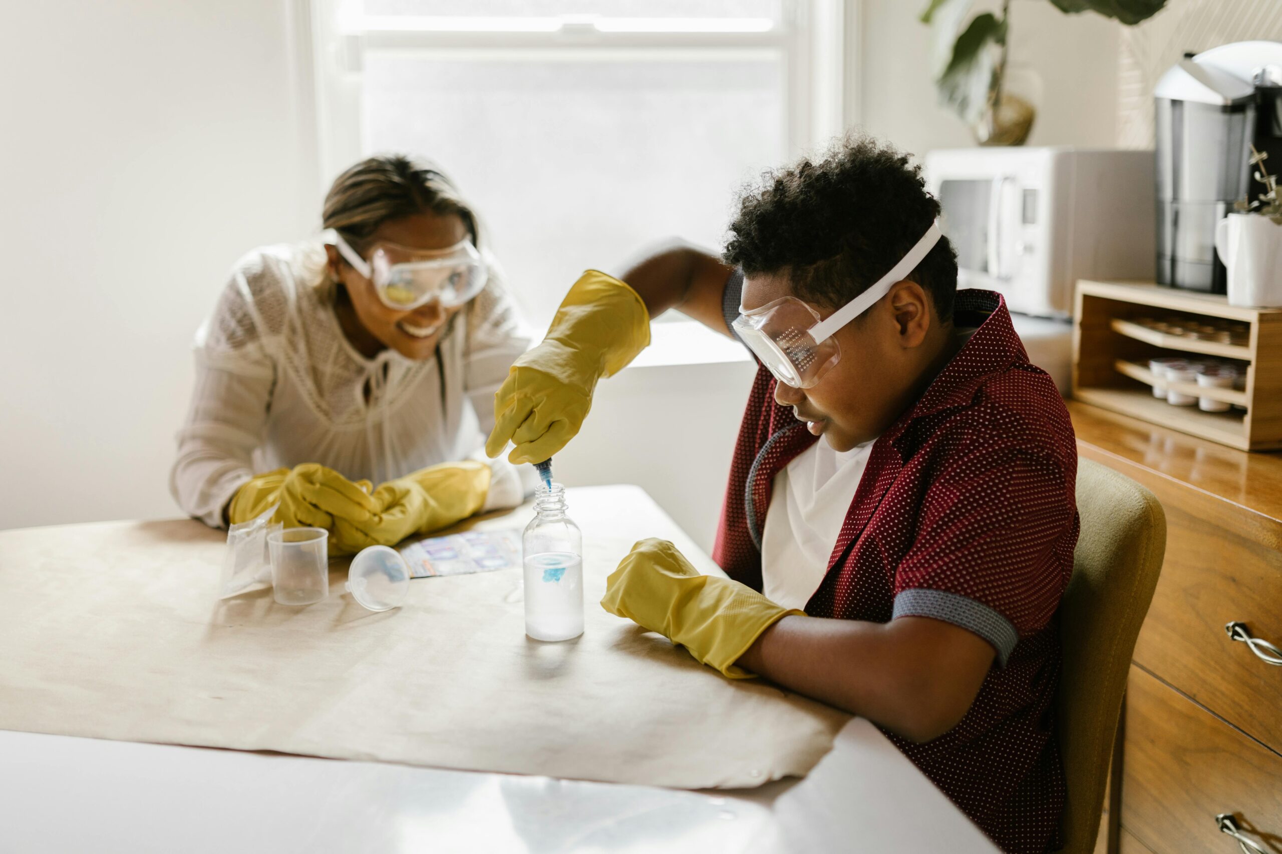 Learner and adult exploring their passions in an unschooling setting