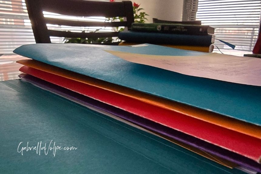 Caregiver paperwork organization system using physical folders